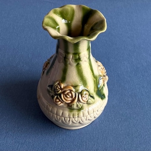 Preowned green ceramic floral designed signed flower vase