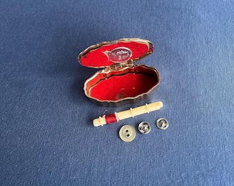 vintage preowned metal gold tone traveling sewing kit made in japan
