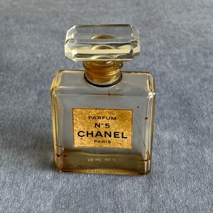 7) Chanel Perfume Bottles Empty And Partially Full