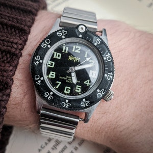 Reloj de cuarzo Sieger / Reloj de cuarzo Unisex 1990, estilo buceador - trabajo