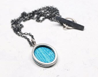 Turquoise blue hand printed aluminium and silver rivet necklace