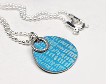 Turquoise blue hand printed aluminium and mini silver circle necklace