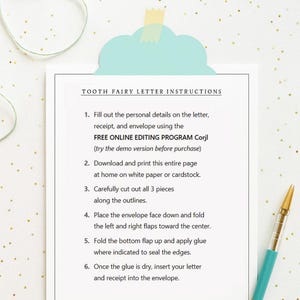 May include: A white sheet of paper with instructions for a Tooth Fairy letter, receipt, and envelope. The text includes steps for filling out details, downloading, printing, and assembling the items. A blue and yellow cloud-shaped paper clip and a pen are also visible.
