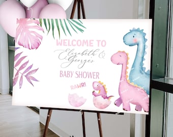 Könnte beinhalten: Willkommen zur Babyparty von Elizabeth & George Schild mit einer rosa und blauen Dinosaurier-Illustration. Das Schild hat ein rosa und grünes tropisches Blattdesign.