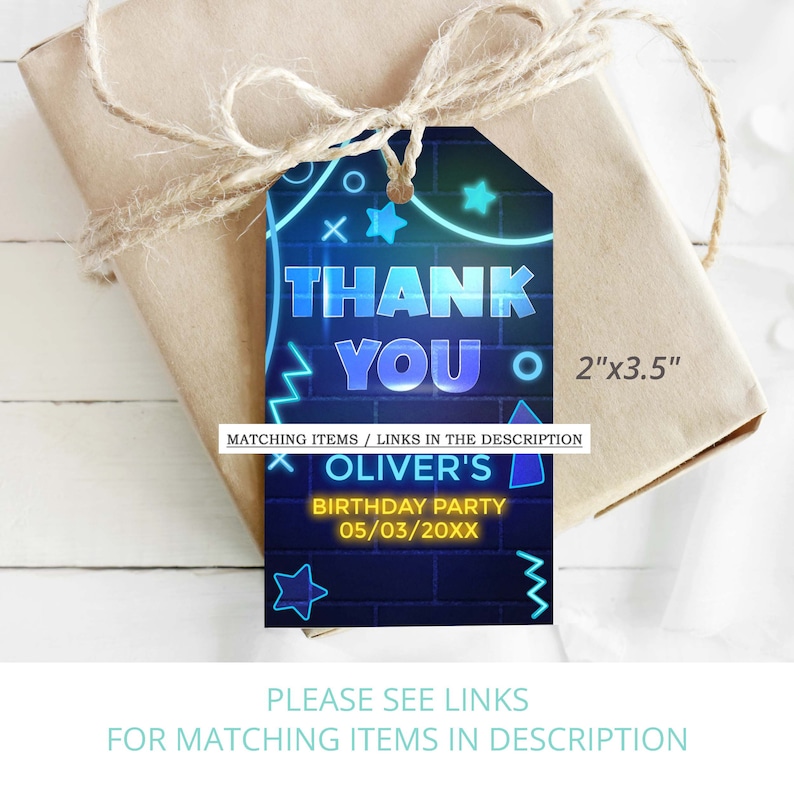 May include: A blue and black thank you tag with neon accents. The tag says "Thank You" and "Oliver's Birthday Party 05/03/20XX". The tag is 2 inches by 3.5 inches.