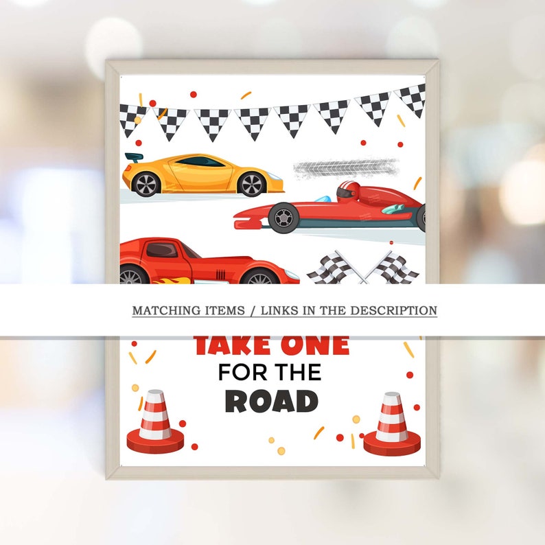 Puede incluir: Un cartel imprimible con un tema de coches de carreras rojo, amarillo y negro. El cartel dice "Toma uno para el camino" y tiene dos conos de tr&aacute;fico naranja a cada lado del texto.