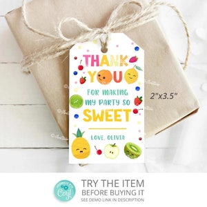 May include: A white thank you tag with colorful fruit illustrations and the text "THANK YOU FOR MAKING MY PARTY SO SWEET LOVE, OLIVIA". The tag is 2 inches by 3.5 inches.
