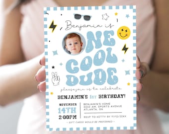 May include: A blue and white birthday invitation with the text "Benjamin is One Cool Dude" in a retro font. The invitation includes a photo of a baby boy, a date, and a time. The invitation is decorated with lightning bolts, stars, and a peace sign.