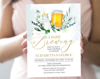 May include: A baby shower invitation with a watercolor illustration of a baby bottle and a beer mug. The text reads "A Baby is Brewing" and includes the names Elizabeth and George, the date and time of the event, and the location. RSVP information is also included.