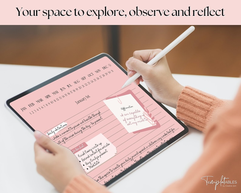 May include: A pink and white digital planner with a calendar, daily intentions, and affirmations. The planner is open on a tablet and a hand is using a stylus to write on the screen. The text on the screen reads "January 1st", "Daily Intentions", "Take a moment to pause and reflect through all of the noise during the day - be present", "Final Casey write up", "Second content for website", "Buy Emily's present", "Meditate", and "Affirmation: I am capable of everything I set my mind to".