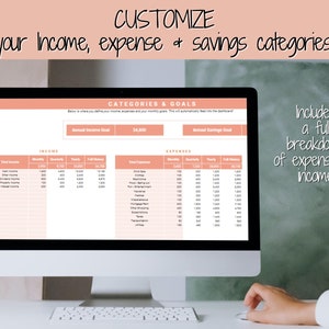 May include: A computer monitor showing a spreadsheet with income, expense, and savings categories. The screen text says "CUSTOMIZE your Income, expense & savings categories!" and "Includes a full breakdown of expenses & income."