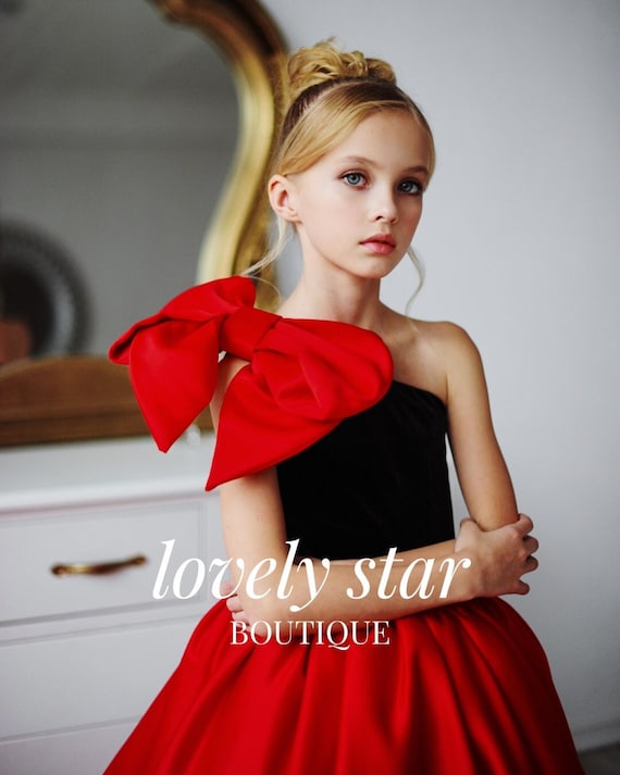 red dress with black bow Red Strapless Oversized Bow Fit & Flare Mini Dress