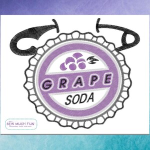 May include: An embroidered patch featuring a purple bottle cap design with a scalloped edge and black safety pin accents. The center displays a cluster of grapes and the text GRAPE SODA in black lettering. The logo SEW MUCH FUN is visible.