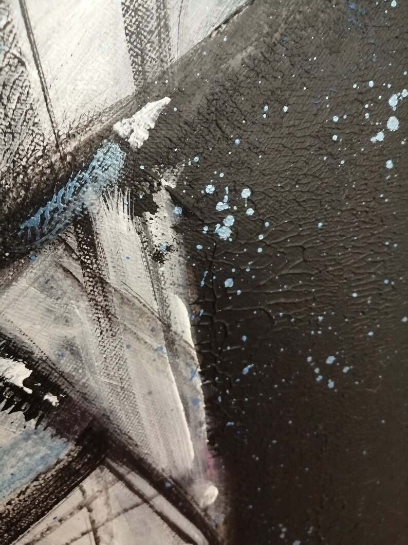 May include: Abstract painting with black, white, and blue paint. The painting has a textured surface and a splattered effect.