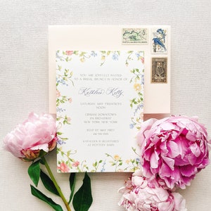 Elegant bridal shower invitation with watercolor flower border. Perfect for a spring garden party theme bridal shower