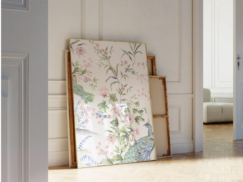 May include: A framed print with a floral design featuring a peacock and pink flowers on a light pink background.