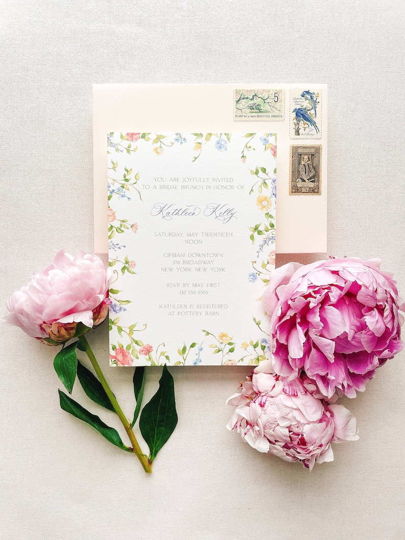 Elegant bridal shower invitation with watercolor flower border. Perfect for a spring garden party theme bridal shower
