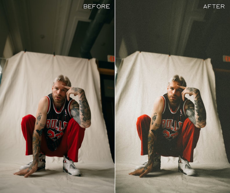 K&ouml;nnte beinhalten: Eine Person tr&auml;gt ein schwarzes und rotes Basketballtrikot mit dem Wort "BULLS" auf der Vorderseite, rote Hosen und wei&szlig;e Turnschuhe. Die Person sitzt auf dem Boden mit verschr&auml;nkten Armen und blickt in die Kamera.
