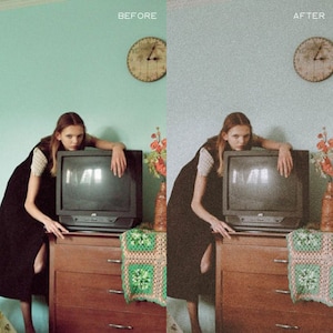 May include: A woman in a black dress leans on a vintage television set with a wooden cabinet. The television is on a dresser with a crocheted throw on top. The room is painted a light blue color and has a clock on the wall.