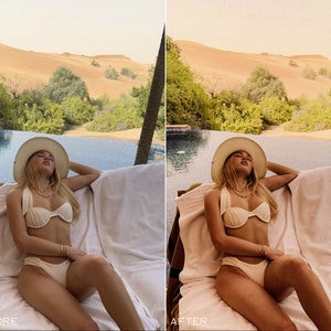 Puede incluir: Una mujer con un bikini blanco y un sombrero de paja de ala ancha se relaja en una tumbona blanca junto a una piscina. La piscina est&aacute; rodeada de vegetaci&oacute;n exuberante y dunas de arena en el fondo.