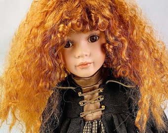Stunning little red head girl From The Leonardo Collection