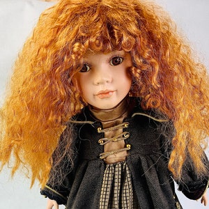Stunning little red head girl From The Leonardo Collection