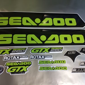 May include: A set of black and green Sea-Doo decals with the text "Sea-Doo", "GTX", "Limited 260", "Rotax Power", "S3 Hull", and "iBR Intelligent Brake & Reverse".