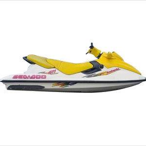 May include: A white and yellow Sea-Doo personal watercraft with a black seat and a Bombardier logo. The watercraft has a pink Sea-Doo logo and a colorful graphic design.