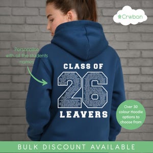 May include: A navy blue hooded sweatshirt featuring a large white graphic on the back that reads CLASS OF 26 LEAVERS, with the numbers 2 and 6 filled with numerous small student names. The text Personalise with all the students names is visible.