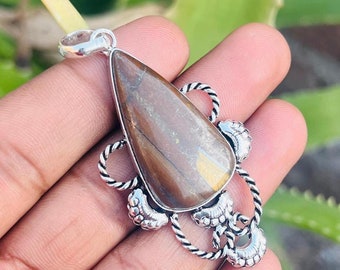 Colgante de ojo de tigre hecho a mano en plata de ley 925