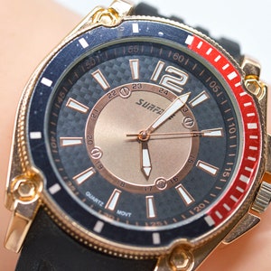 Rose gold tone with black dial, large quartz wrist watch