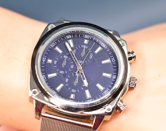 Steel tone with blue dial, mesh adjustable bracelet, large quartz wrist watch