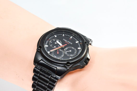 Nautica black tone mans steel , sports wrist watch - image 1