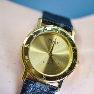 Time , gold tone, quartz , vintage wrist watch