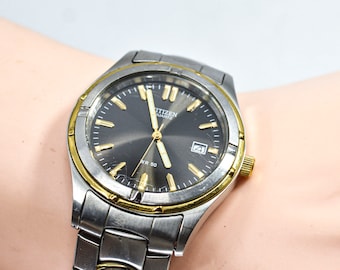 Citizen Quartz steel tone with black dial ,mens quartz wrist watch