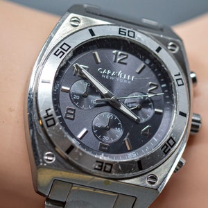 Caravelle New York. steel tone with gray dial quartz wrist watch