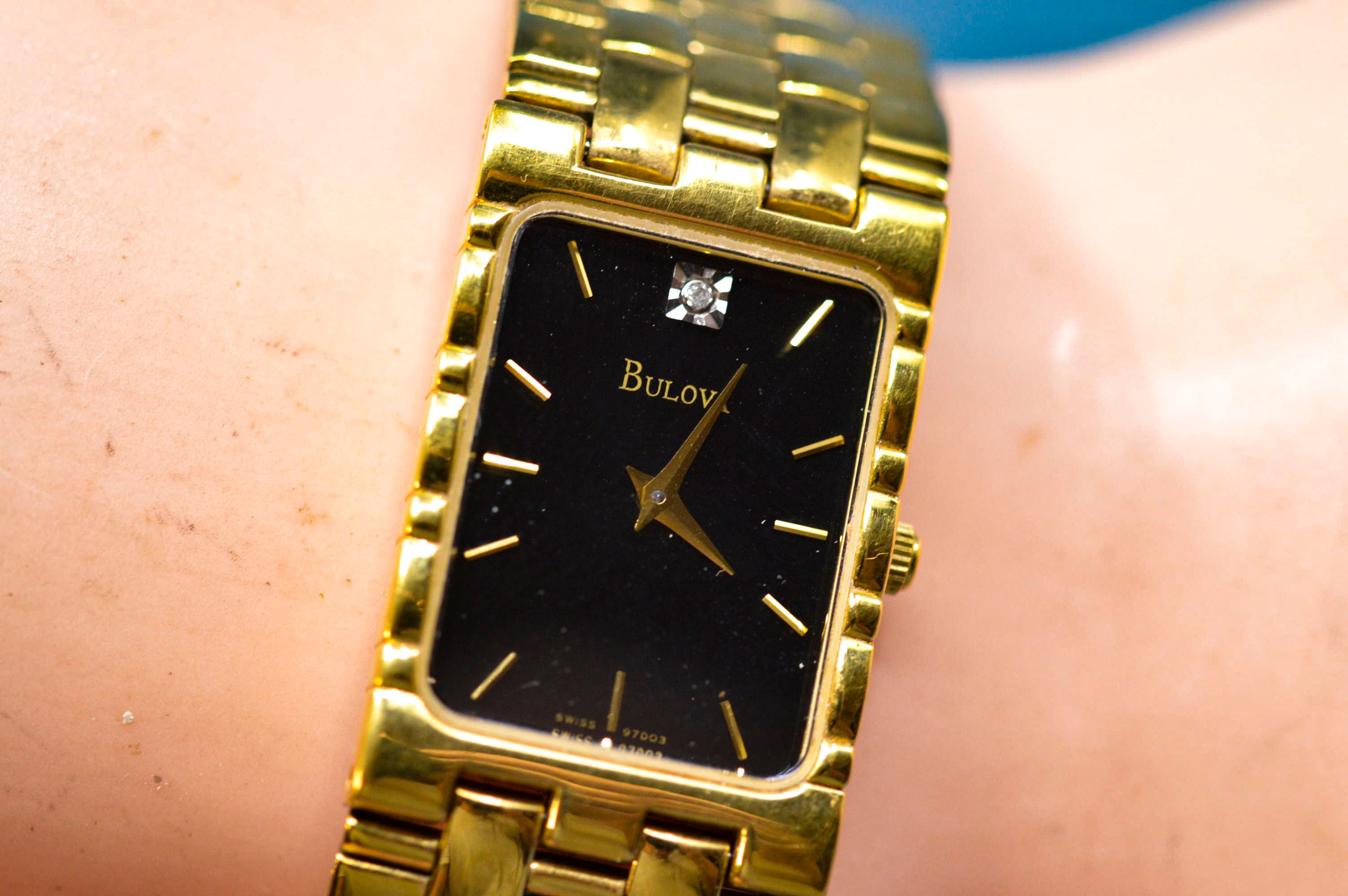 Bulova gold square watch discount