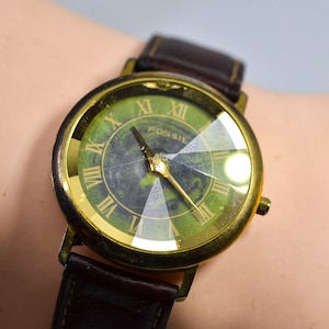 Fossil watches hotsell 7070 price