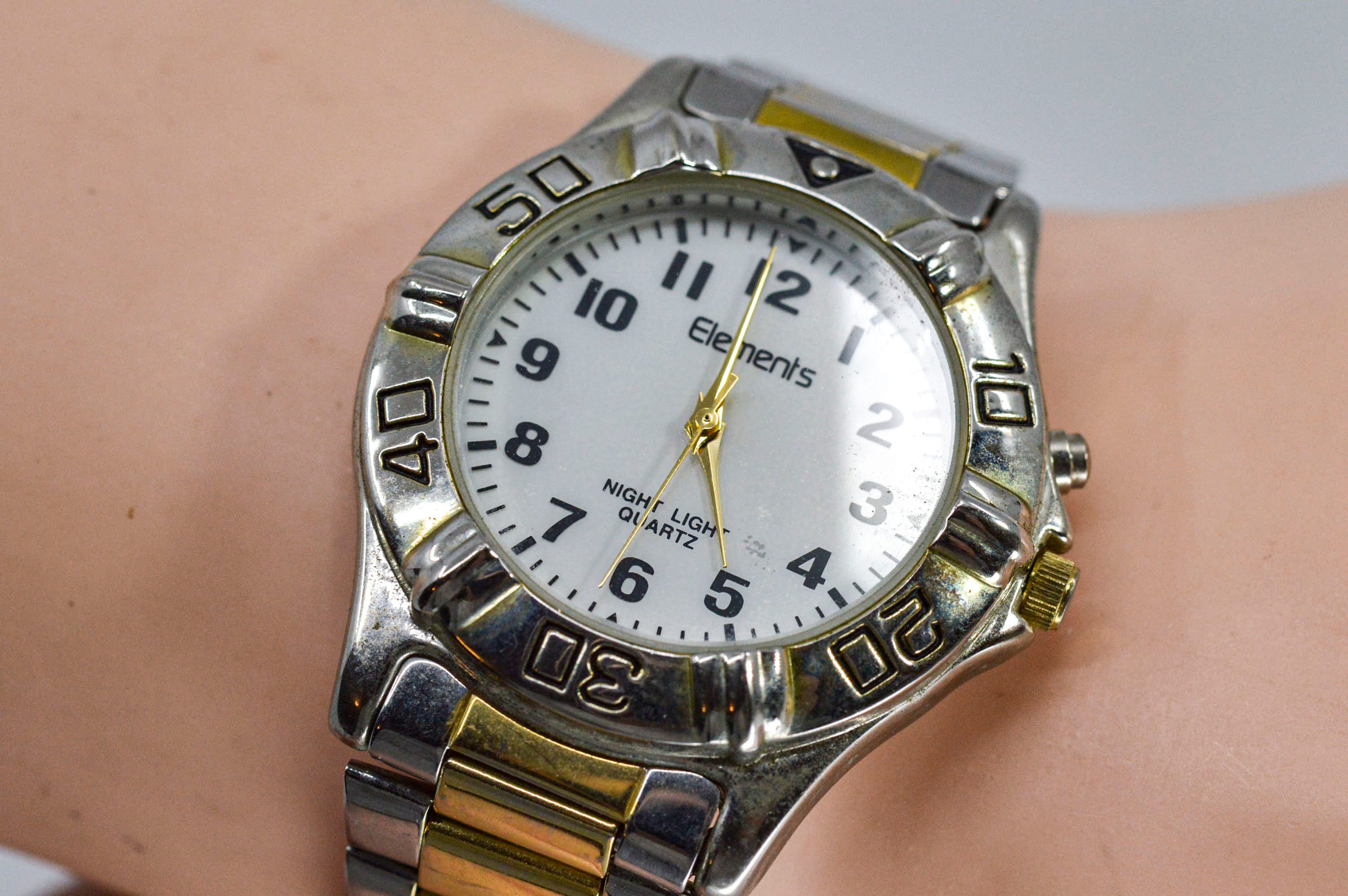 Elements steel and gold tone with white dial ,mens quartz wrist watch