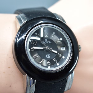 Croton, steel and black tone, quartz wrist watch