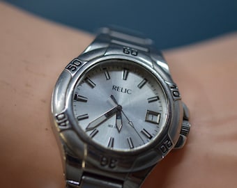 Relique, ton argenté, montre-bracelet à quartz