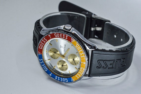 Batane Guess Inc tono de acero con esfera plateada reloj de pulsera vintage para hombre Etsy Mexico