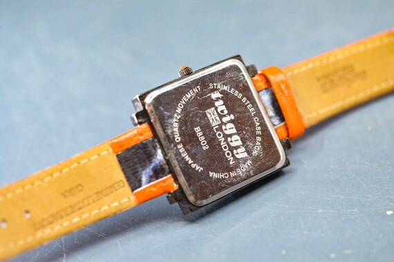 Twiggy London, dark steel tone, orange bracelet, … - image 8