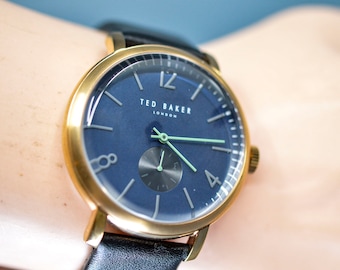 Ted Baker, gold tone, black  dial, quartz wrist watch