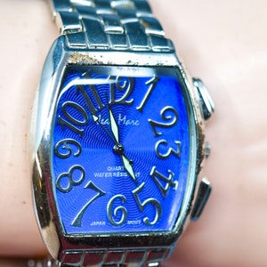 Steel tone with blue dial, large  quartz wrist watch