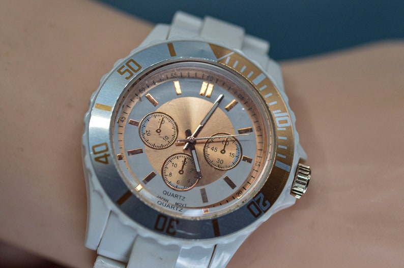 White and rose gold tone, plastic, quartz wrist watch image 1