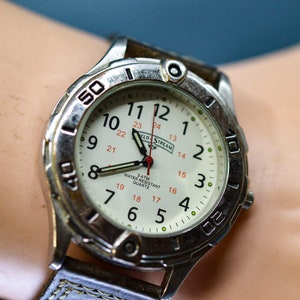 Field and stream watch shop with compass