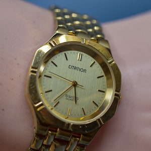 Citation, gold tone , quartz wrist watch