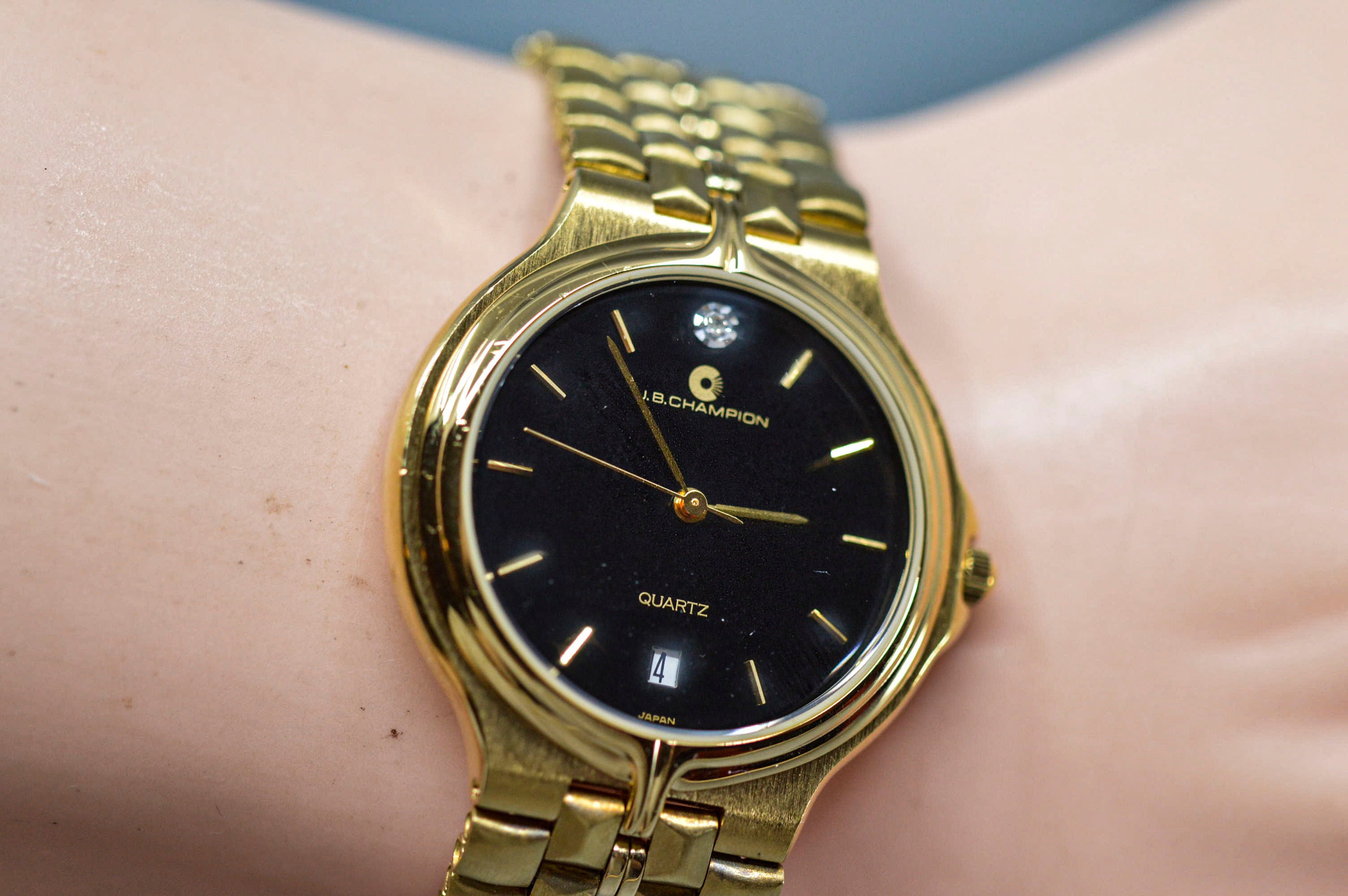 J.B. Champion Gold Tone With Black Dial Quartz Wrist Watch -