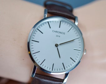 Chronos , steel tone with white dial, quartz wrist watch